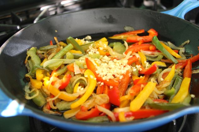 frittata adding minced garlic