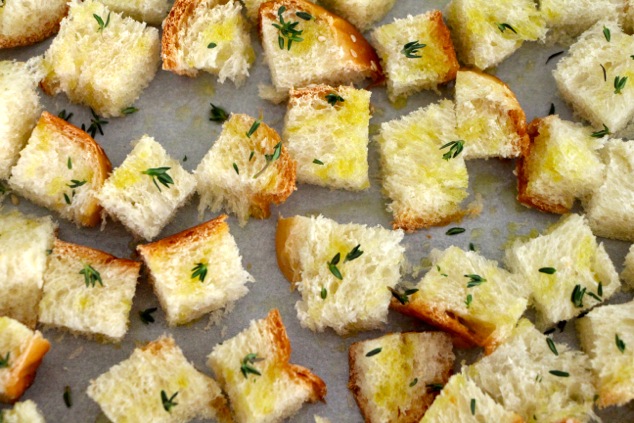 Challah cubes with thyme up close