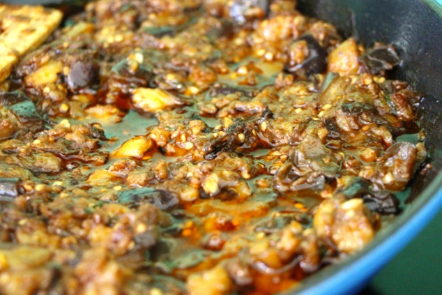 eggplant salad adding balsamic vinegar