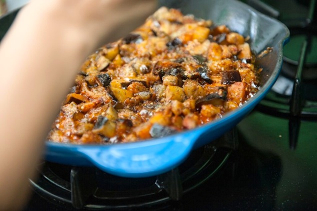 eggplants cooking in pan