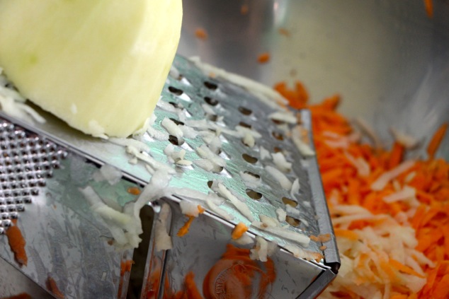 grating potato up close