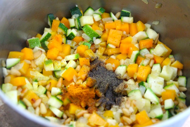 adding spices to pot