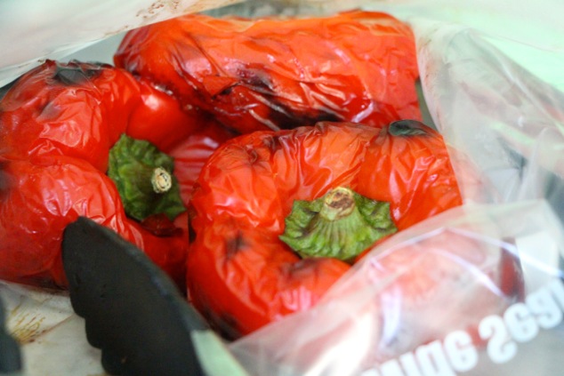 putting roasted peppers in a sealed bag