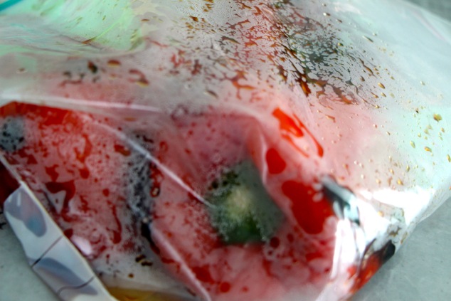 roasted peppers steaming in sealed bag