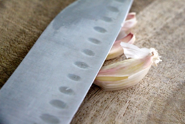 garlic cloves on board