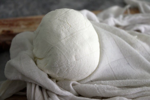 Labneh ball out of cheesecloth