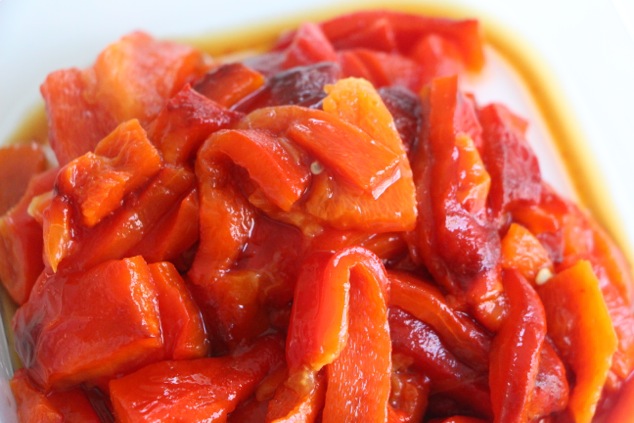 cut roasted peppers in container