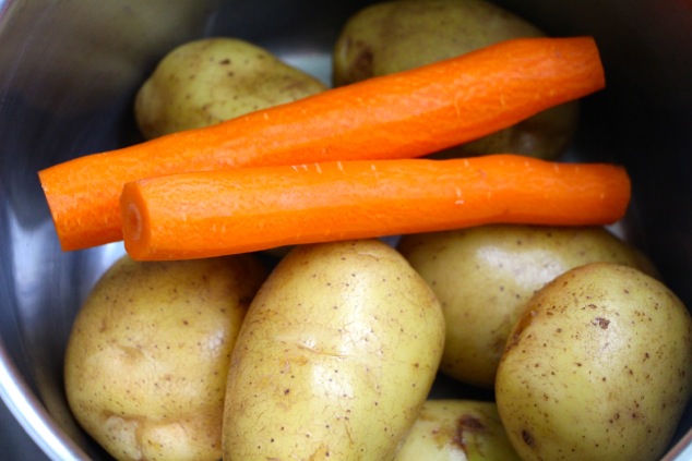 potatoes and carrots in pot