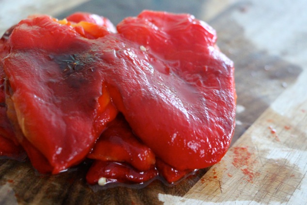 roasted peppers on cutting board up close