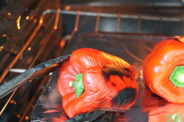 rotating roasting peppers with tongs