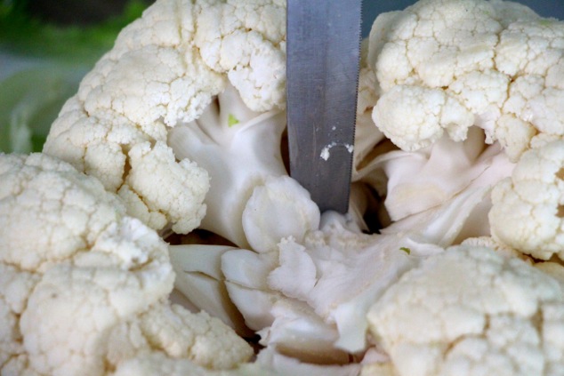 cutting cauliflower core up close