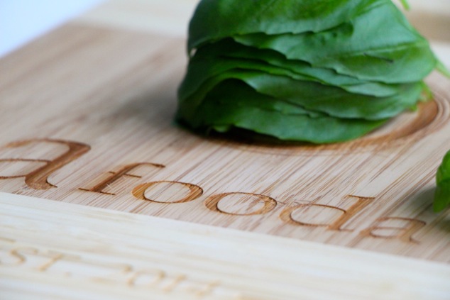 basil leaves stacked up close