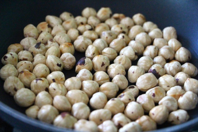 roasting hazelnuts in a pan