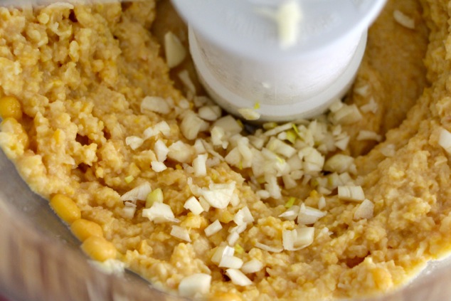 adding garlic in food processor