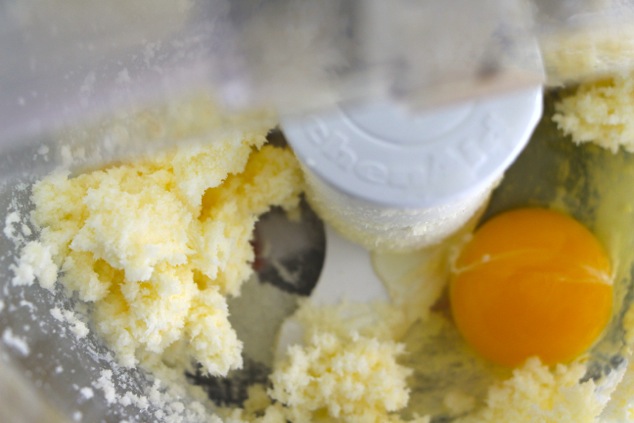 adding egg to butter and sugar