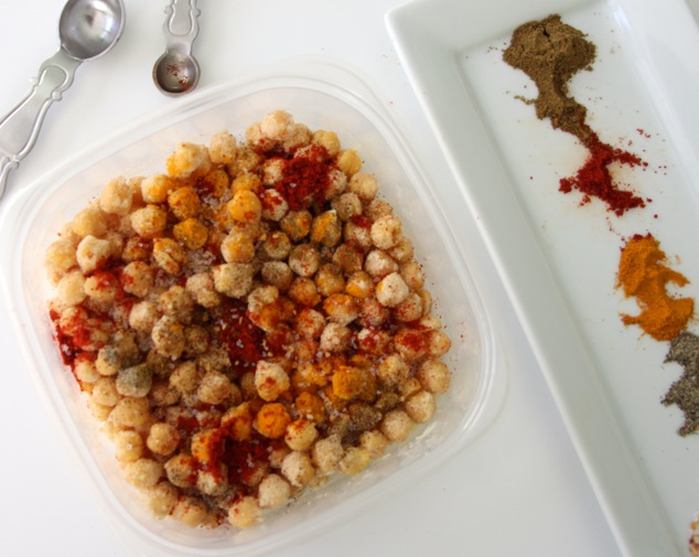 adding spices to chickpeas