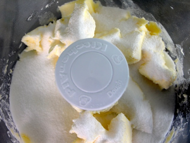 adding sugar to butter
