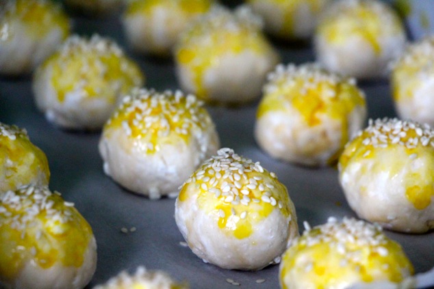cheese balls with egg and sesame up close
