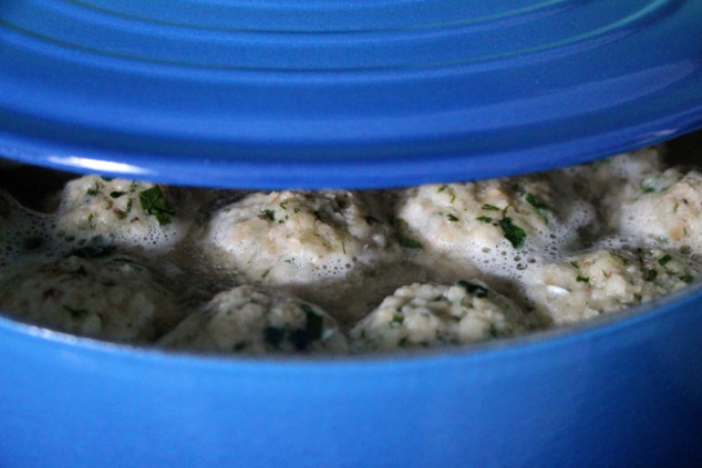 partially covered matzo balls pot