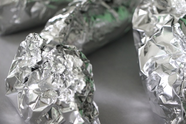 wrapped potatoes in aluminum foil