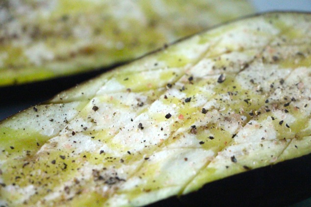 salt and papper on eggplant up close