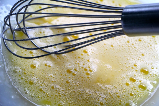 whisking eggs and sugar