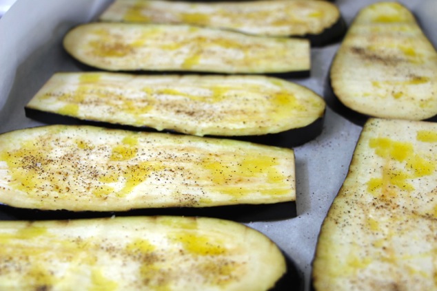 eggplant slices on baking sheet