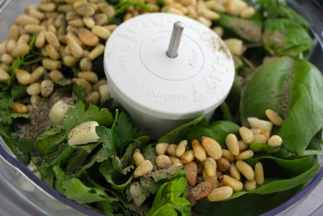 pesto ingredients in food processor up close