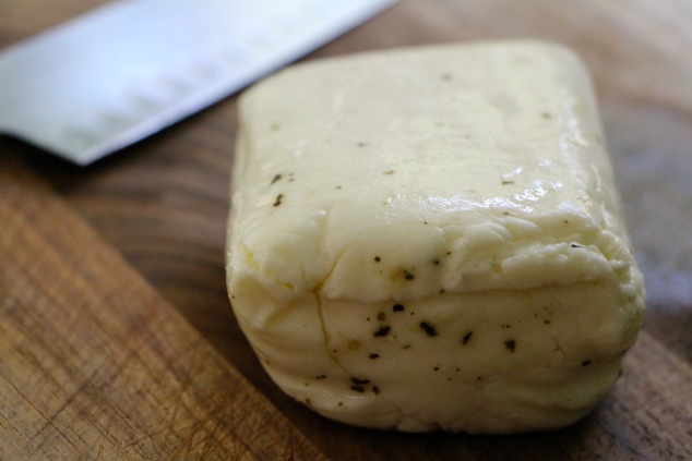 Halloumi cheese on cutting board