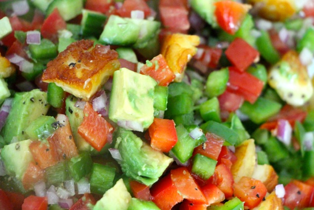 adding dressing to salad