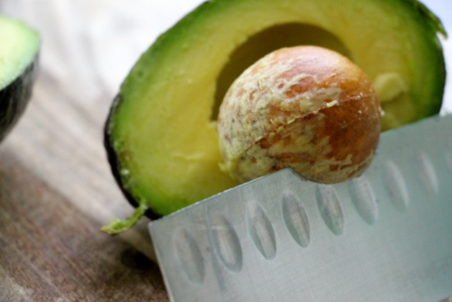 avocado removing pit up close