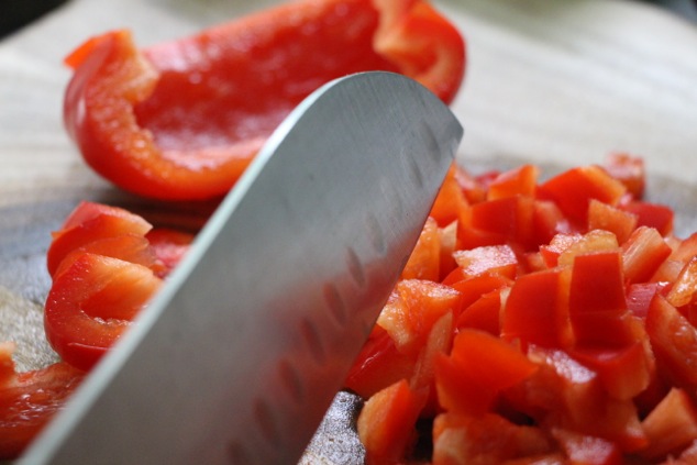 chopping red bell pepper