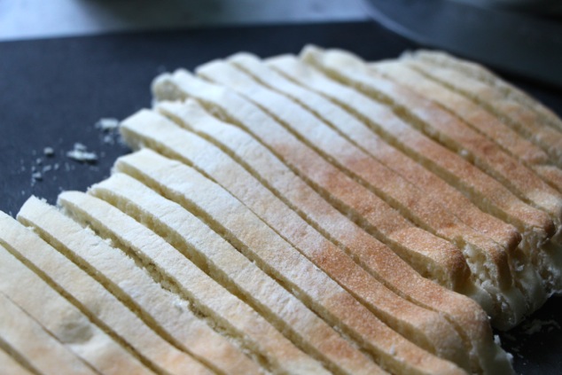 cutting pita into sticks up close