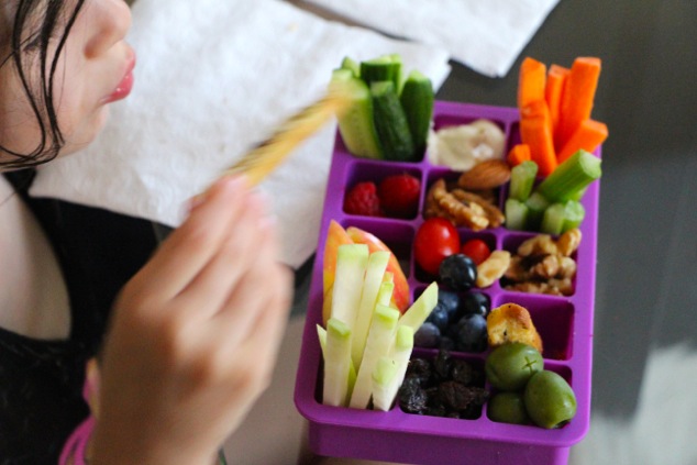 eating from ice cube snack tray