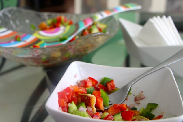 eating halloumi salad at the table