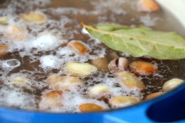 fava beans in pot and bay leaf