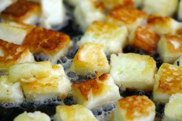 fried halloumi cheese cubes close up