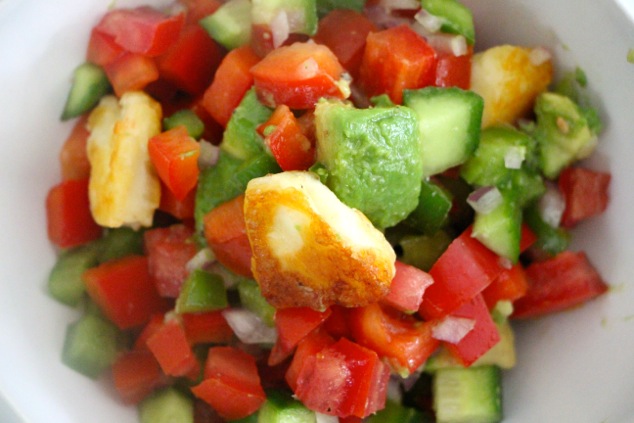 halloumi salad served in individual bowl close up