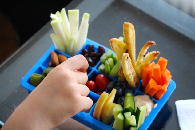 ice cube snack tray with hand