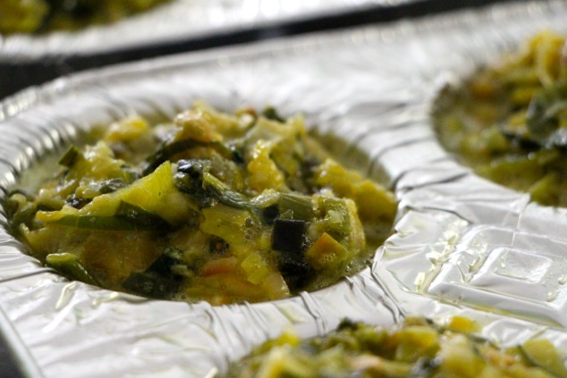 leek mixture in cupcake tray up close