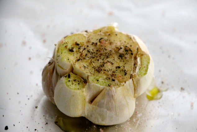 garlic head with salt and pepper