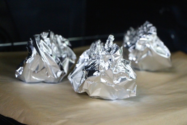 wrapping garlic in aluminum foil