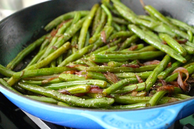 lubia rubia cooking in pan with salt and pepper