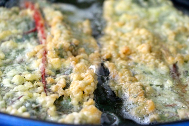 frying red swiss chard up close