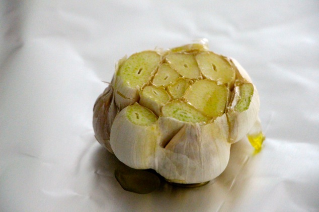 garlic head with olive oil