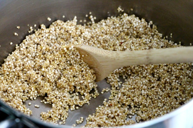 toasting quinoa in a pot