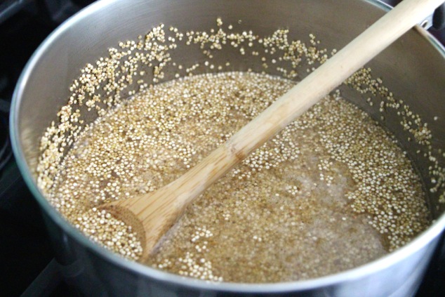 adding water to quinoa and mixing