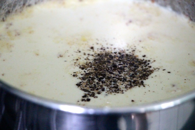 adding-black-pepper-to-cream-mixture
