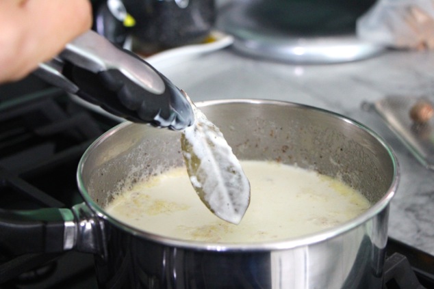 removing-bay-leaf-from-cream-mixture