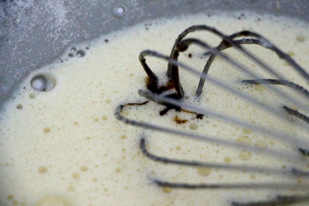 adding-vanilla-paste-to-whisked-eggs